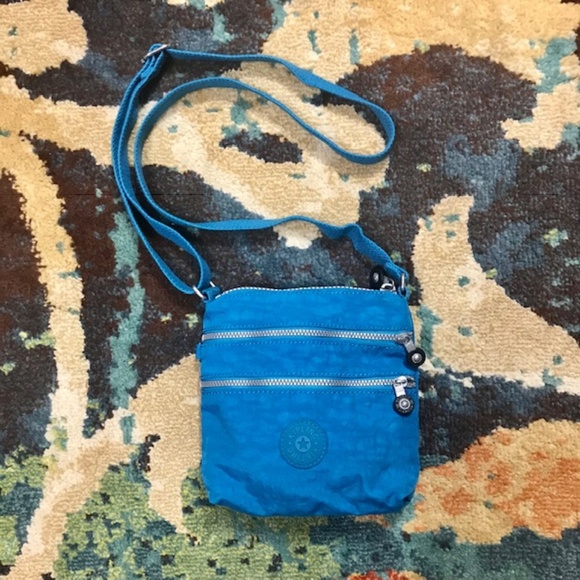 Kipling Handbags - Kipling blue small crossbody purse